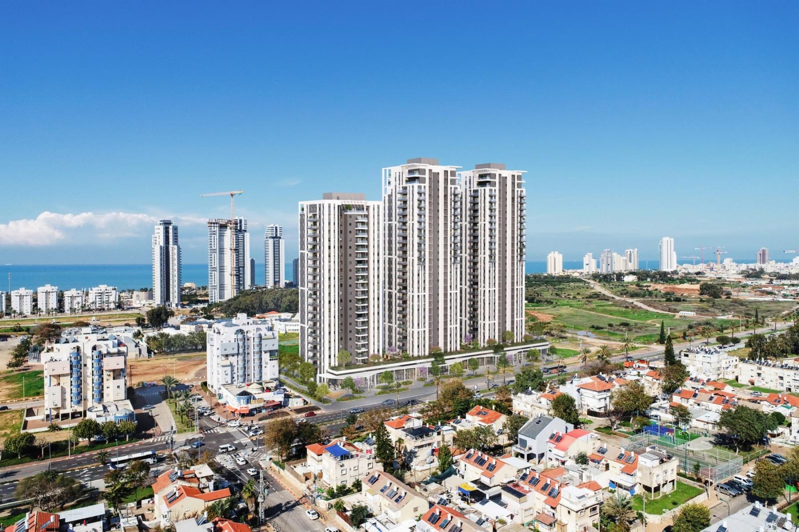 Story Galei Yam, new construction in North Netanya: aerial view of the towers and the sea (developer rendering)